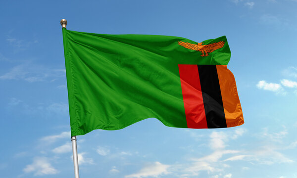 Zambian national flag flying in the wind