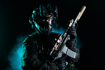 Tactical figure in advanced gear holding rifle with night vision and mask