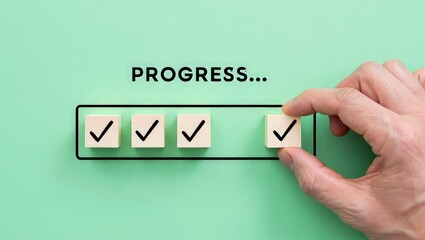 Checklist and task progress tracking concept. A hand placing the final checkmark on wooden blocks in a progress bar, task completion, productivity, goal setting, and efficient project management.