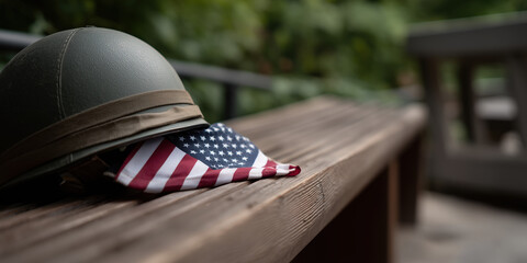 American flag and soldier’s helmet in a symbolic setup. Concept honoring those who served.