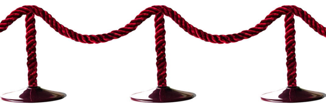 Red velvet ropes arranged with stanchions, symbolizing security and exclusivity at events.