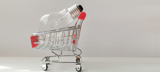 Shopping cart with salt shaker minimalist studio product photography clean setting close-up unique concept