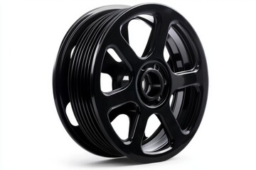 Obraz premium A sleek black film reel, a symbol of classic movie history, sits precisely centered on a stark white isolated background.