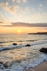 sea beach landscape at sunrise in summer. sun on the sky