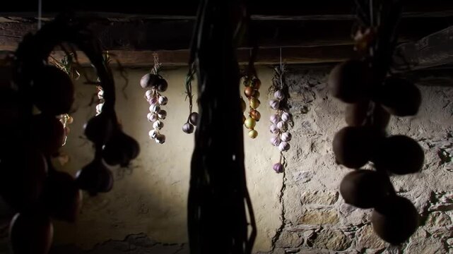 Rustic Pantry: Dried Vegetables Hanging In The Cellar