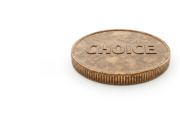 A coin with the inscription CHOICE on a white background. Space for text.