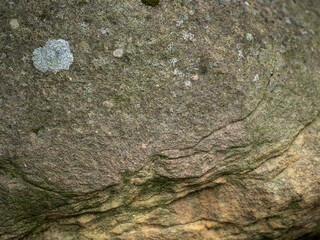 Rough stone surface with cracks