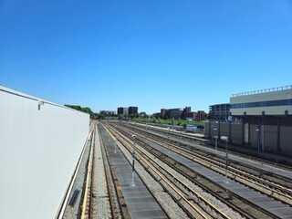 Obraz premium ROTTERDAM, NETHERLANDS,26.05.2025; The railway Station. A view from above of railroads, tracks and trains.Interior of Rotterdam Centraal subway station platform.Metro