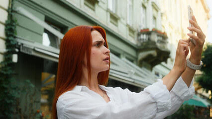 Upset confused Caucasian woman girl tourist smartphone user sad frustrated displeased businesswoman...