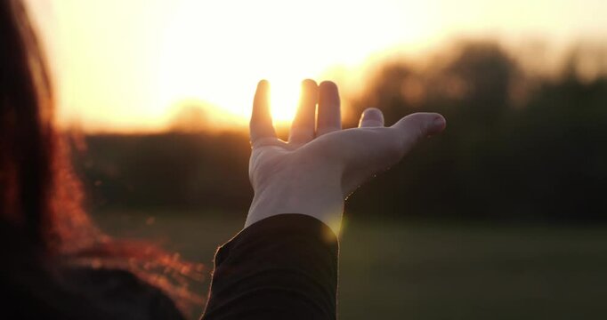 symbol hope in form of palm extended to sunset rays reflects expectation future through symbol of hope, instilling optimism and dream soul of everyone, because symbol of hope beckons to new horizons