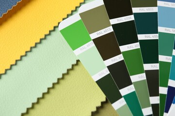 Samples of colorful fabrics and color palettes, closeup
