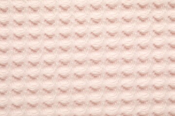 Clean beige waffle towel as background, top view
