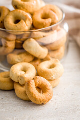 Salted crispy snack rings on kitchen table.