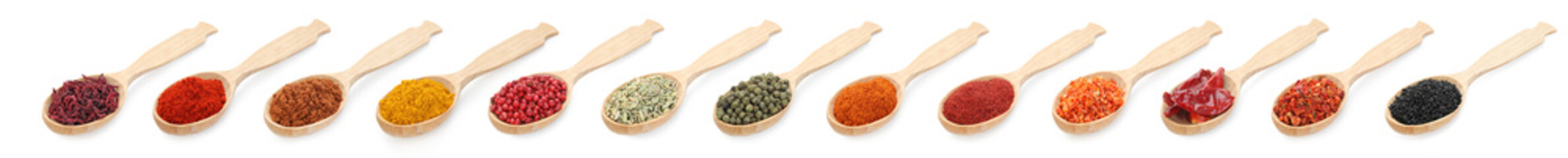 Different aromatic spices in wooden spoons on white background, set