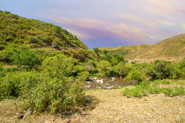 Feel the tranquility of the river flowing through the rocky canyon. Immerse yourself in the beauty...