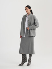 Fashion shooting in studio . Professional model , fashionable clothes and style, new collection. stylish look	