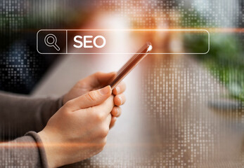 Unrecognizable Businesswoman Browsing Internet On Smartphone Searching SEO Specialist Sitting In...
