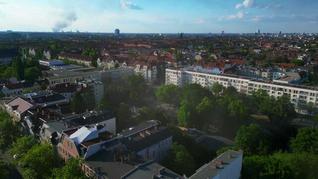 Rescue helicopter landing in Berlin urban park. Nice aerial view flight drone