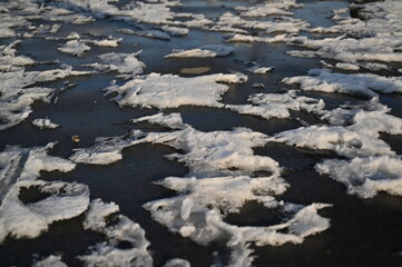 footprints in the snow in the city, ozheliditsya, winter in the city	
