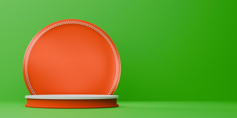 The bright orange podium stands out against the green background