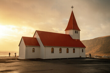 Fototapeta premium Vík í Mýrdal church with red roof in Iceland