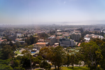 An aerial view of Berkeley, California, with the bay in the background.