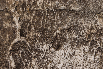 Old rough mossy concrete wall, stone textured background