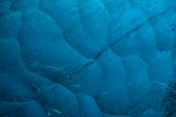 Naklejka premium Abstract background of textured blue ice