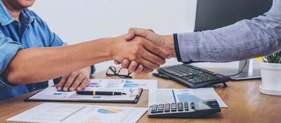 Finishing up a meeting, Business handshake after discussing good deal of Trading contract for both companies and gesturing people connection deal, Meeting and greeting concept