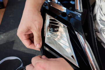 Careful precision is essential when installing a car headlight assembly for optimal performance