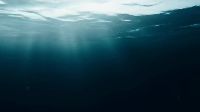 Serene Underwater Scene with Sun Rays Piercing Through Deep Blue Ocean Water Creating an Ethereal Atmosphere and Abstract Textures Optimized for Adobe Stock