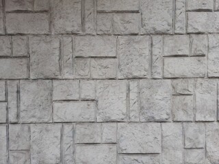 Obraz premium concrete wall with imitation of paving slabs. space for text.