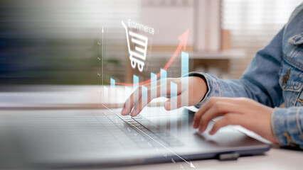 Hands typing on a laptop with an upward bar chart and e-commerce icon, symbolizing online sales growth, digital marketing, and business success in modern e-commerce platforms.
