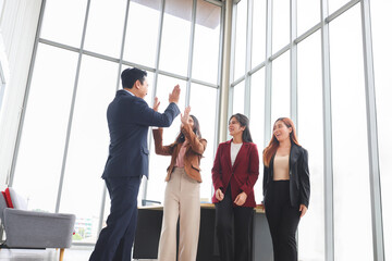 Business Team Meeting in Office, Successful Businesspeople Team Celebrating with High Five in Office, Happy Colleagues Celebrating Success in Office