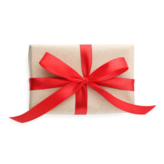 Gift wrapped in kraft paper with bow isolated on white, top view