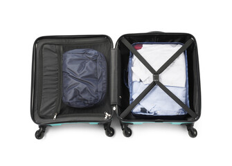 Open suitcase with packing cubes isolated on white, top view