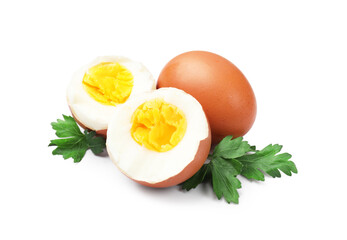 Hard boiled eggs and parsley on white background