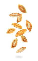 Tasty baked patties falling on white background