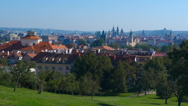 Prague panoramic view from riegrovy sady park. Scenic view of prague's cityscape including prague castle, petř&iacute;n hill, and the vltava river, showcasing the city's unique architecture