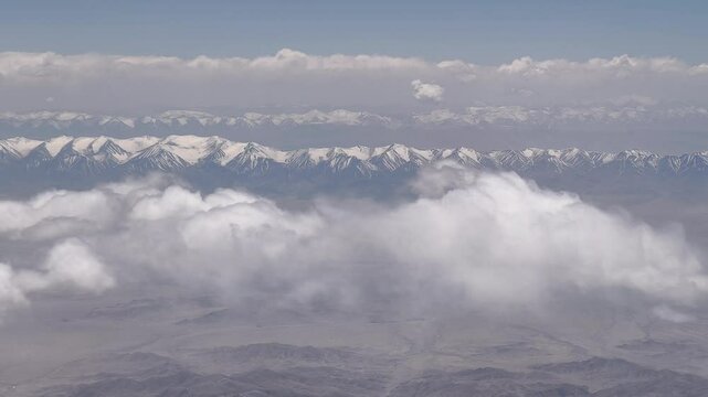 Aerial shot of Qilian mountains covered with snow in Gansu province, China.
