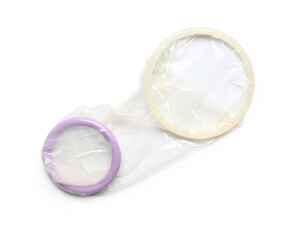 Open female condom isolated on white background