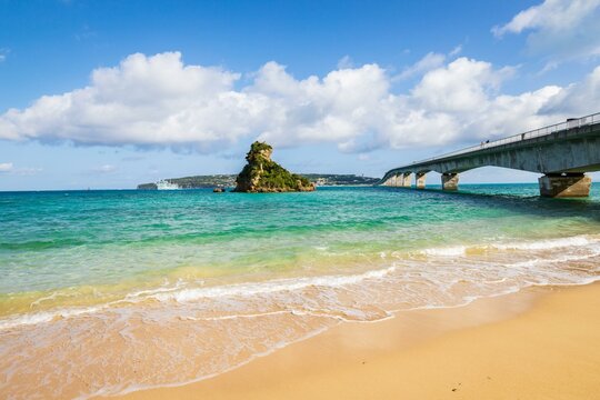 Scenic View of Kouri Island and Bridge from Okinawa Beach, Japan