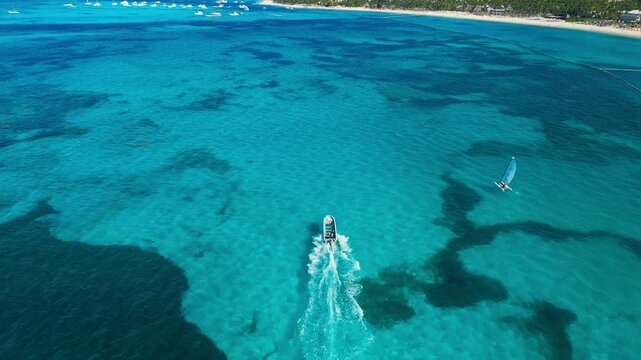 Aerial view of speedboat on the turquoise ocean