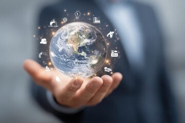 A person's hand gently cradles a translucent globe, encircled by glowing icons representing global interconnectedness and sustainable development