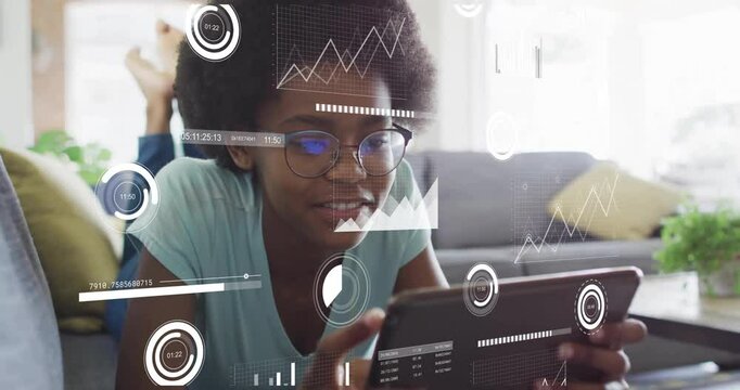 Female teenager tapping circular icon on tablet activating charts and timer for data analysis - Powered by Adobe