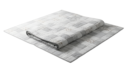A neatly folded quilt showcasing a modern design with subtle patterns, placed on a clean surface, ideal for home decor