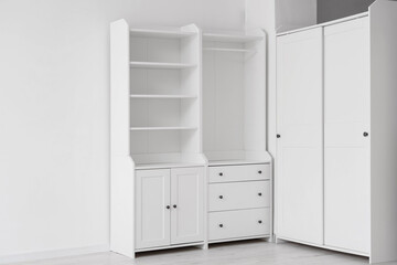 Empty closet with drawers in room