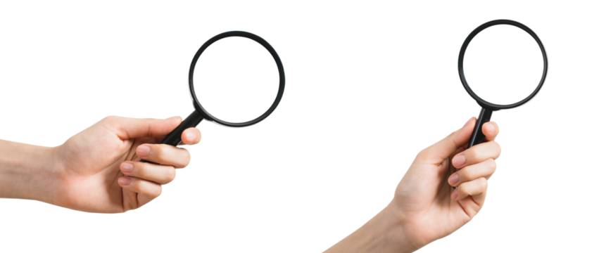 Hand holding magnifying glass isolated on white background.