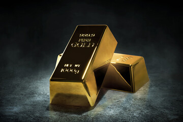 Stack of shiny gold bars on dark background
