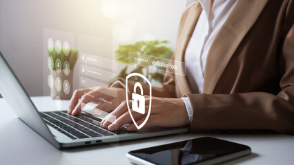 Businesswoman use secure laptop encryption technology, protect business and financial transaction data from cyber attacks, intelligent protection digital attacks. Cybersecurity and data protection.